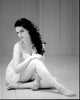 Black and white photo print of Katie McGrath sitting on the floor