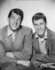 Dean Martin and Jerry Lewis posed in coat with white collar photo print.