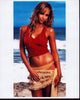 Jessica Alba beach photo print in red top and gold skirt