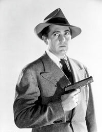 Classic portrait photo print of Sheldon Leonard in coat with pistol