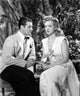 Moon Over Miami movie poster featuring Don Ameche and Betty Grable from the 1941 film.