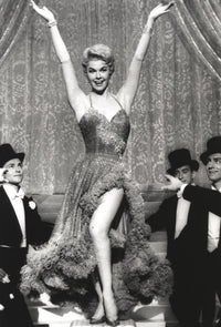 Doris Day dancing photo print with three men looking at her, capturing classic Hollywood charm.