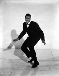 Chubby Checker dancing photo print, vibrant music legend image.