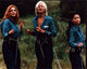 Drew Barrymore, Cameron Diaz, and Lucy Liu in prison uniforms from Charlie's Angels photo print.