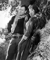 Hondo movie poster print featuring John Wayne and Geraldine Page, 1953.