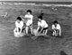 The Beatles splashing water at a beach photo print