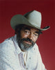 Jack Elam close-up portrait photo print with red background.