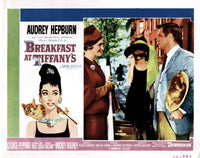 Breakfast at Tiffany's movie poster print featuring Audrey Hepburn and George Peppard.