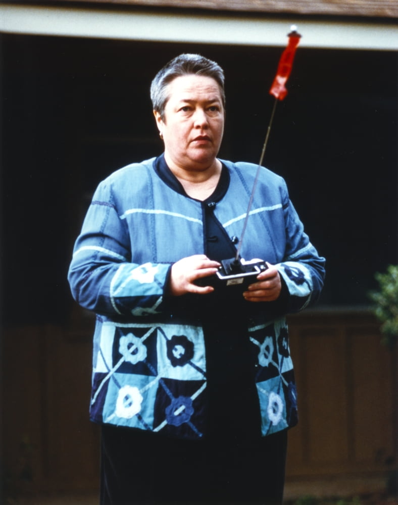 Kathy Bates holding a remote control photo print