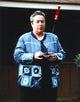 Kathy Bates holding a remote control photo print