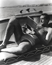Sean Connery sunbathing with a notebook photo print