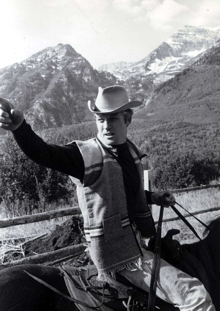 Robert Redford riding a horse photo print available in multiple sizes.