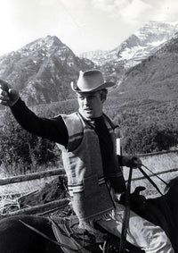 Robert Redford riding a horse photo print available in multiple sizes.
