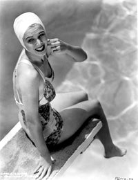Carole Landis vintage photo print in a printed swimsuit on a dive board