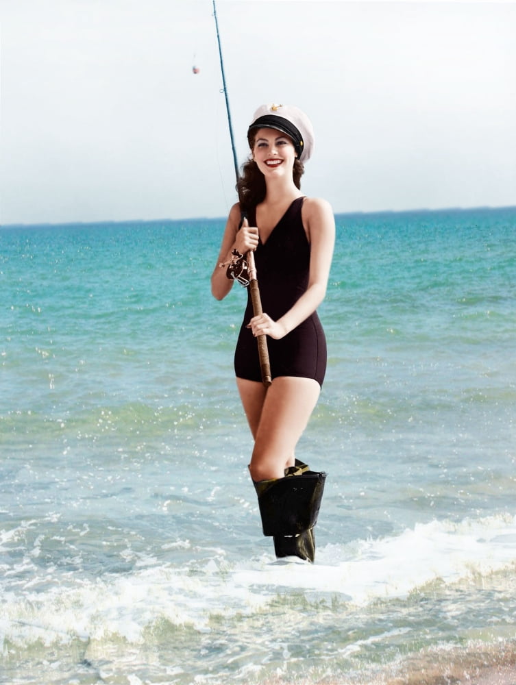 Ava Gardner Fishing Photo Print showcasing classic cinema elegance.