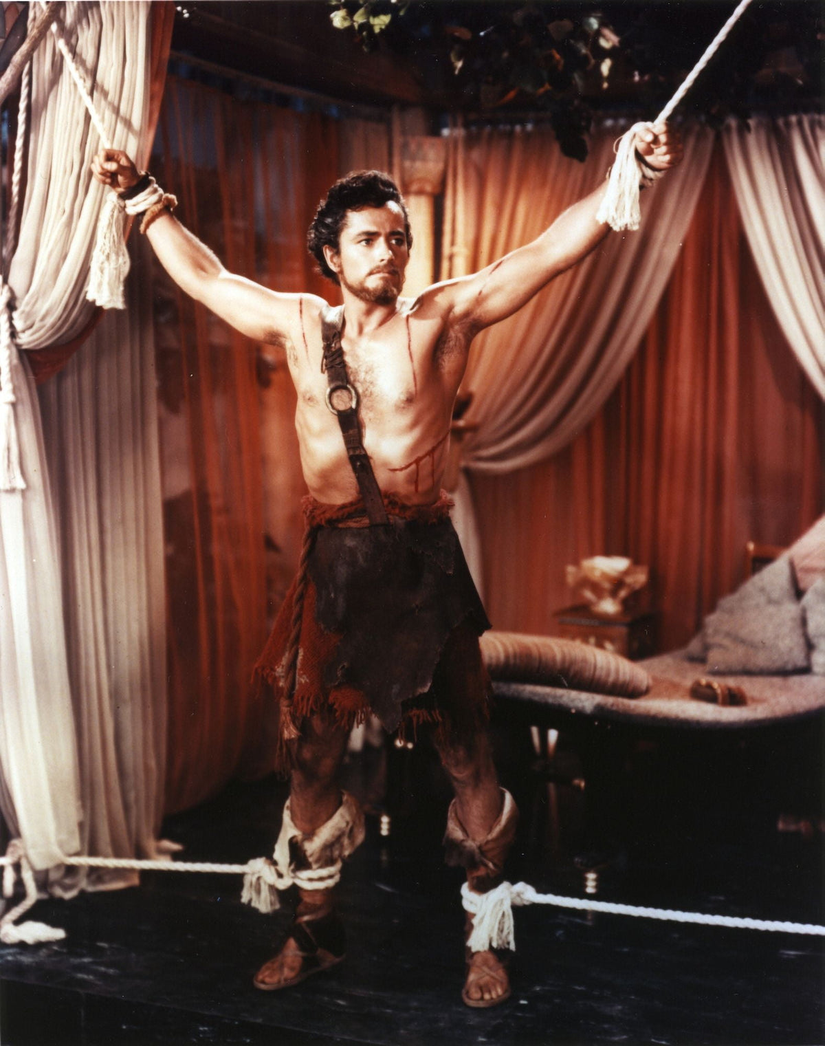 John Derek Tied Up in Barbarian Outfit Photo Print