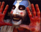 Captain Spaulding photo print featuring Sid Haig with bloody hands.
