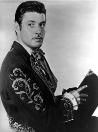 Guy Williams wearing a floral jacket photo print in 8 x 10 size.