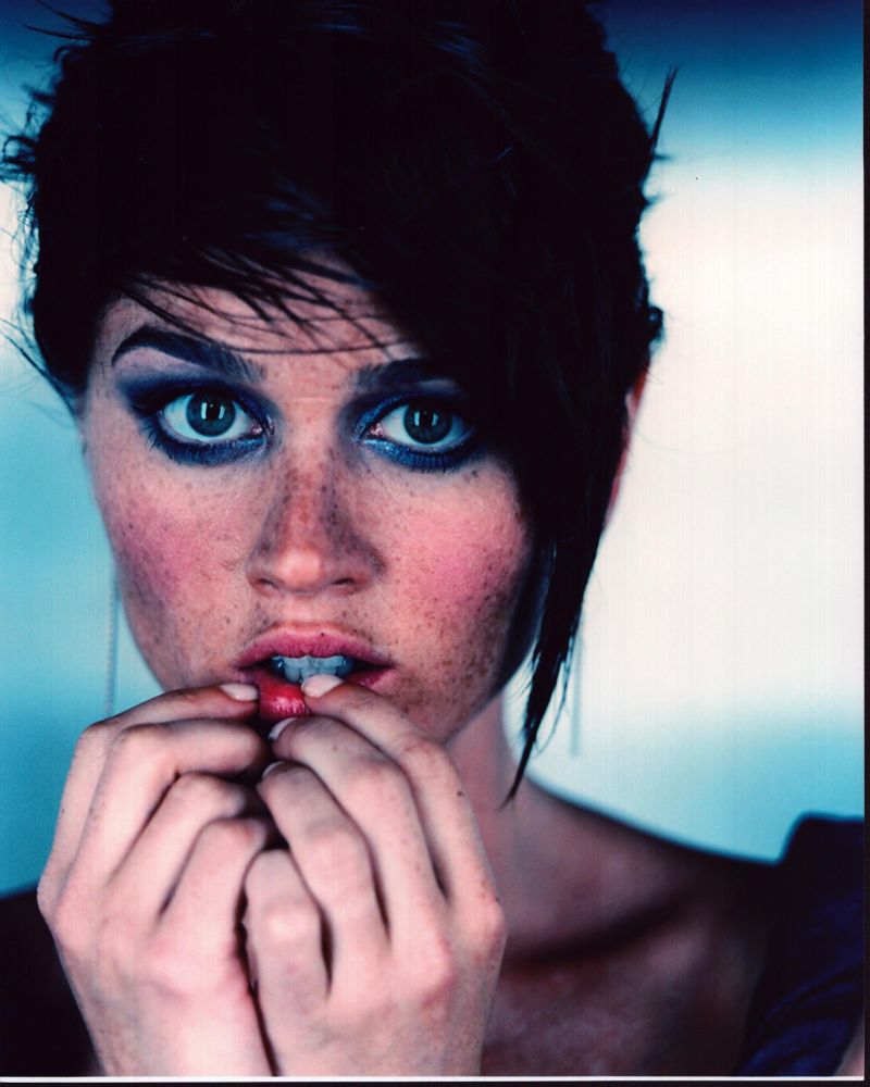 Close-up photo print of Robin Tunney with hands on mouth