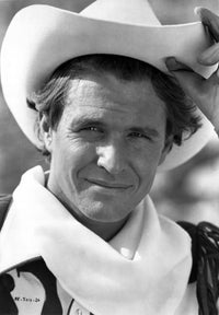 Tom Berenger in a cowboy outfit photo print, available in multiple sizes.