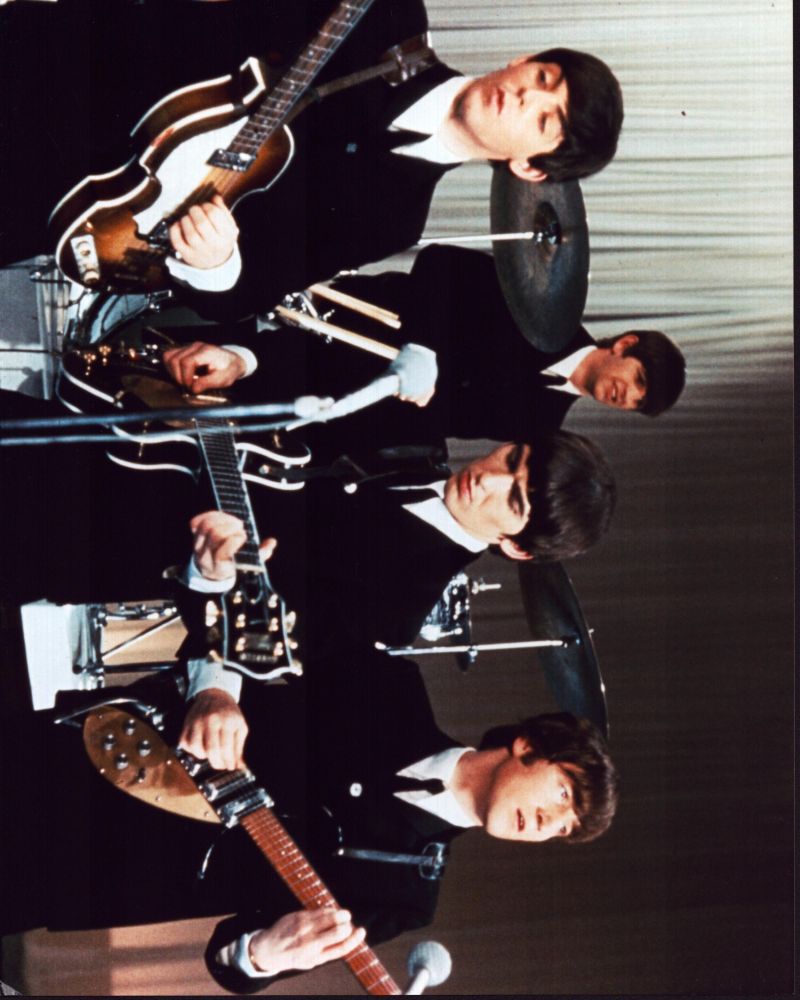 The Beatles performing live photo print
