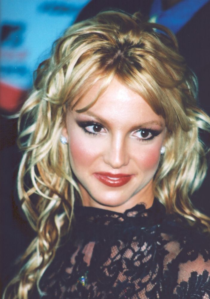 Britney Spears close-up photo print in black lace top.