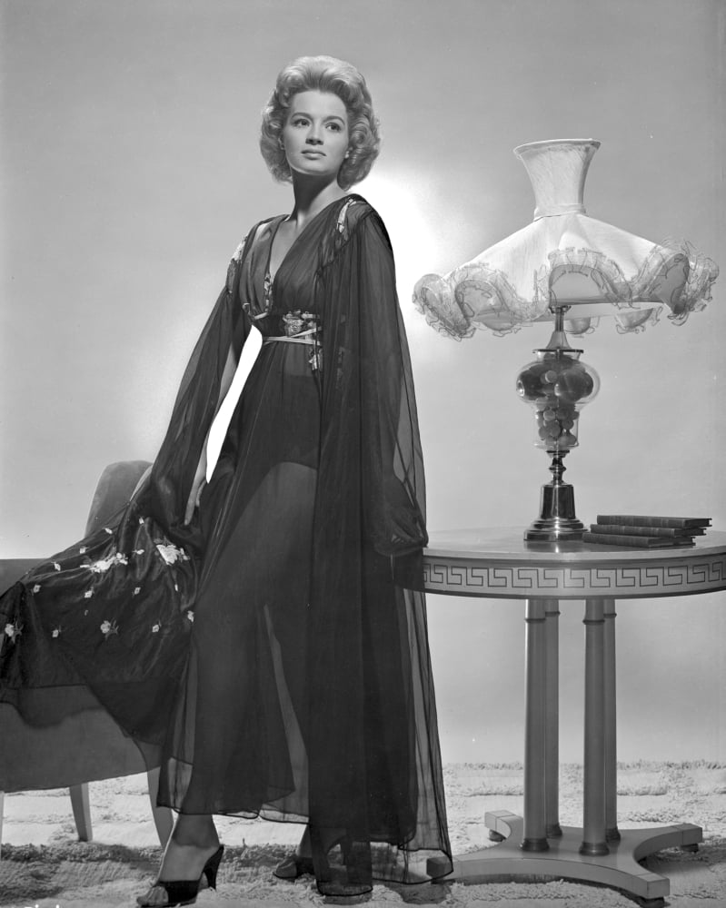 Black and white photo print of Angie Dickinson standing in a dress.