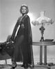 Black and white photo print of Angie Dickinson standing in a dress.