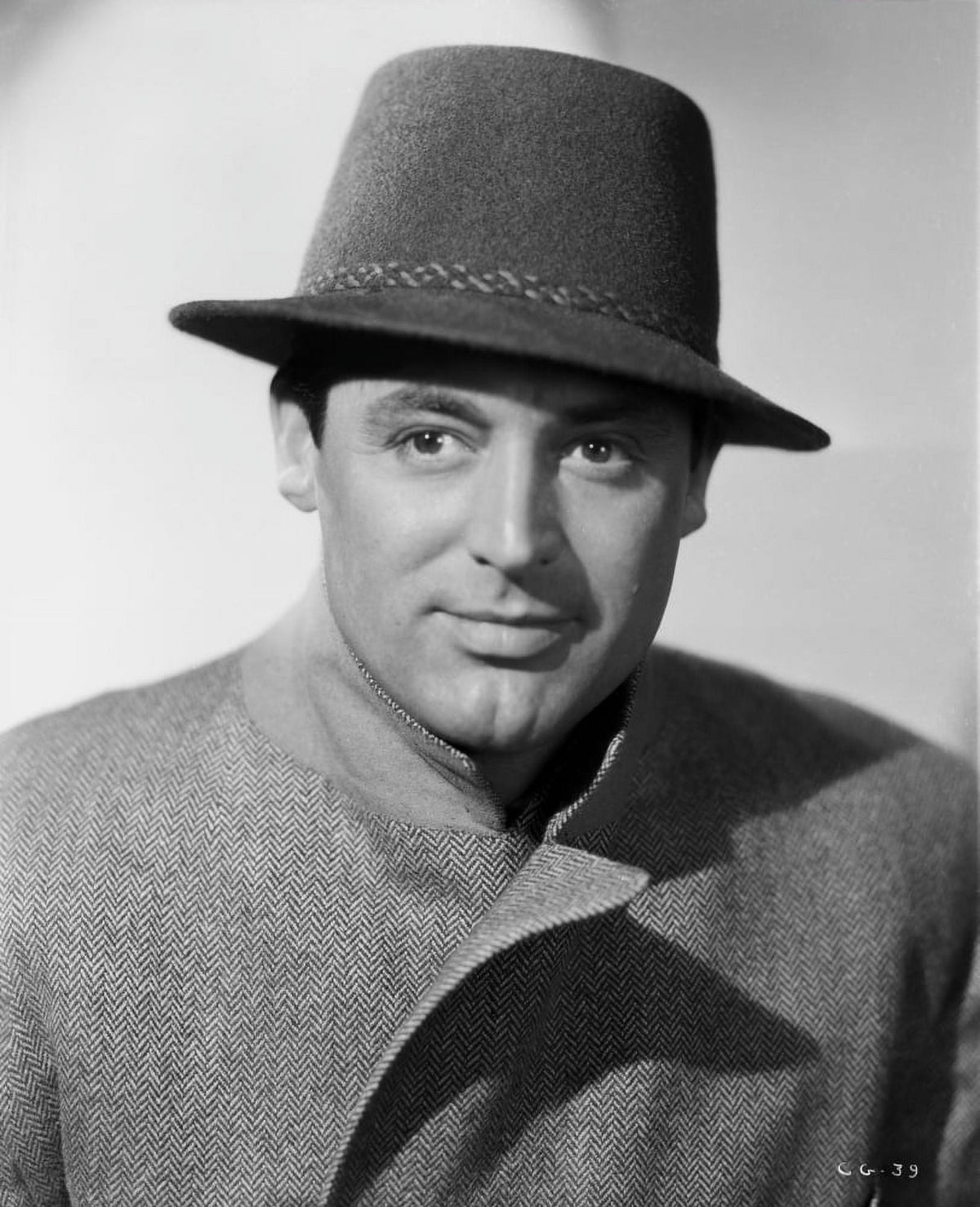 Cary Grant classic photo print in coat and hat, available in multiple sizes.
