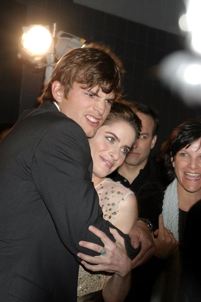 Ashton Kutcher and Amanda Peet at A Lot Like Love Premiere Photo Print