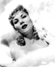Mid-1940s photo print of Veda Ann Borg in vintage Hollywood style.