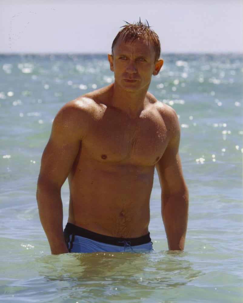 Daniel Craig Beach Photo Print showcasing the actor in a relaxed pose.