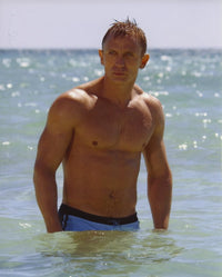 Daniel Craig Beach Photo Print showcasing the actor in a relaxed pose.