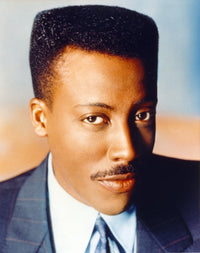 Arsenio Hall portrait photo print in black coat, available in multiple sizes.