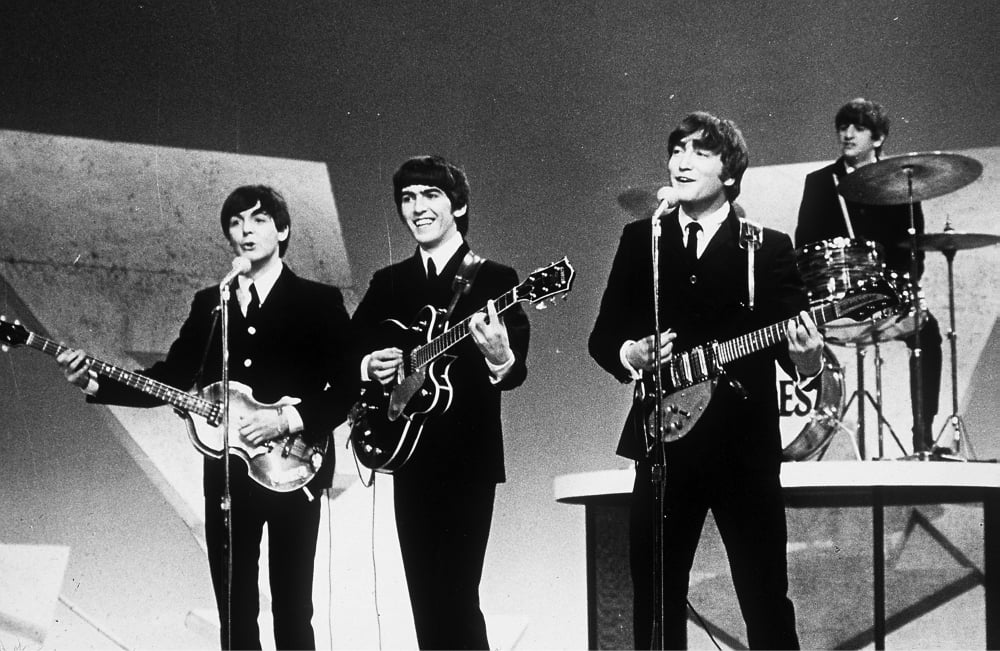 The Beatles performing on The Ed Sullivan Show Photo Print
