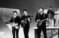 The Beatles performing on The Ed Sullivan Show Photo Print