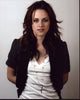 Kristen Stewart in a white shirt and short sleeve blazer photo print.