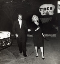 Marilyn Monroe and Joe DiMaggio photo print capturing a classic Hollywood moment.