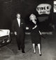 Marilyn Monroe and Joe DiMaggio photo print capturing a classic Hollywood moment.