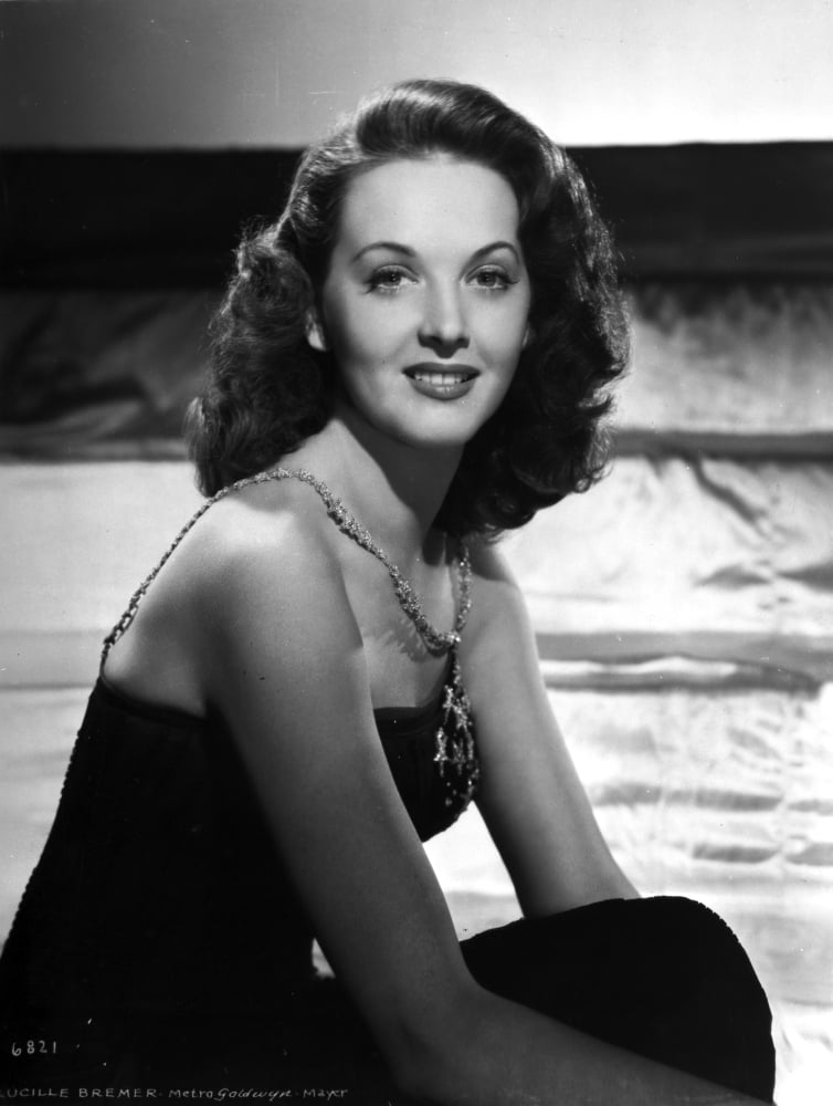 Lucille Bremer seated classic photo print.