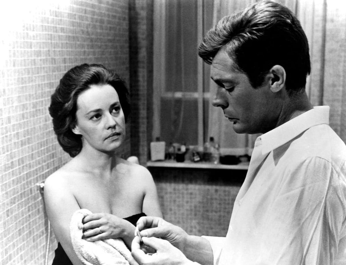 La Notte movie poster print featuring Jeanne Moreau and Marcello Mastroianni.