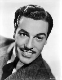 Cesar Romero classic photo print in a suit and tie.