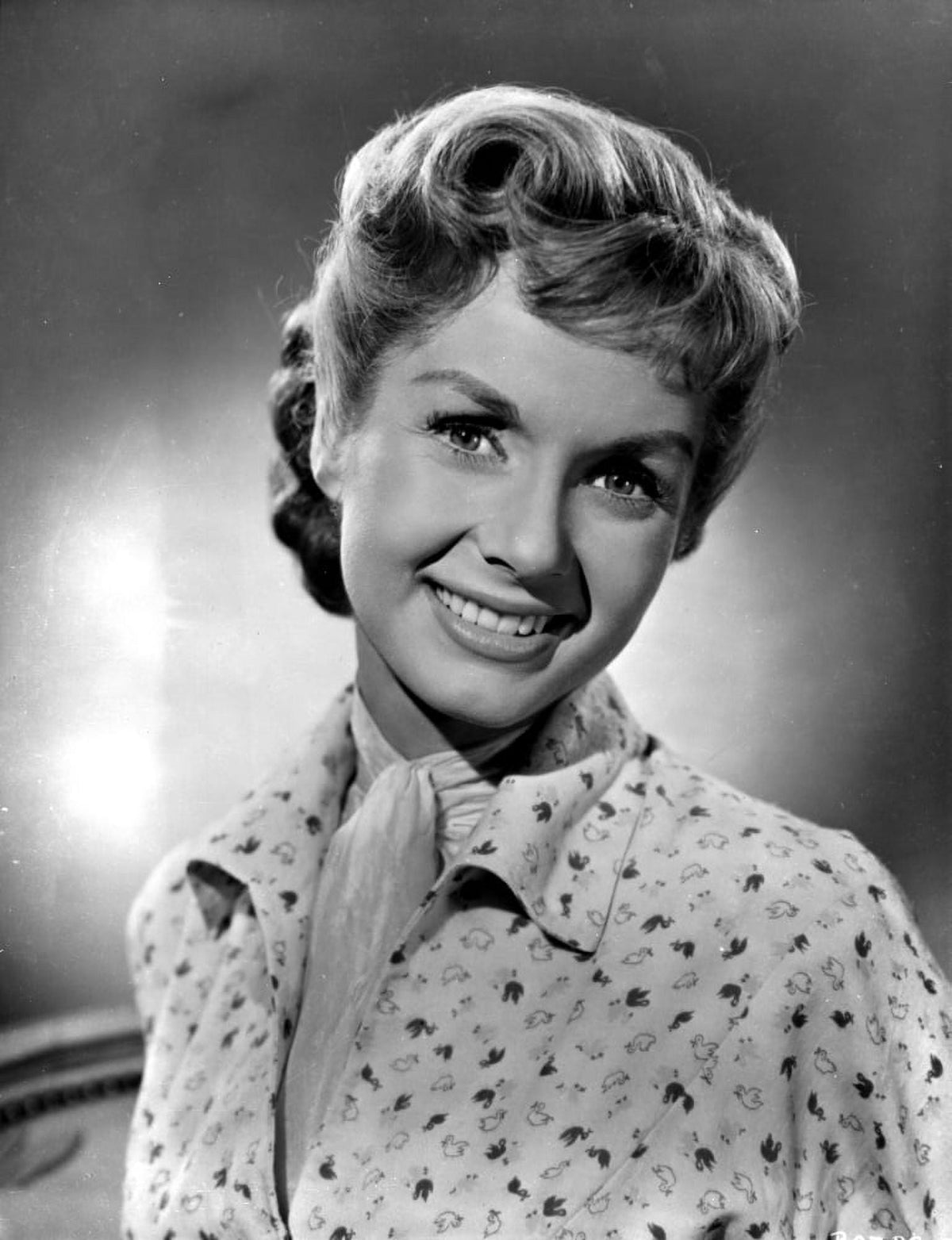 Debbie Reynolds Portrait Photo Print showcasing her iconic charm.