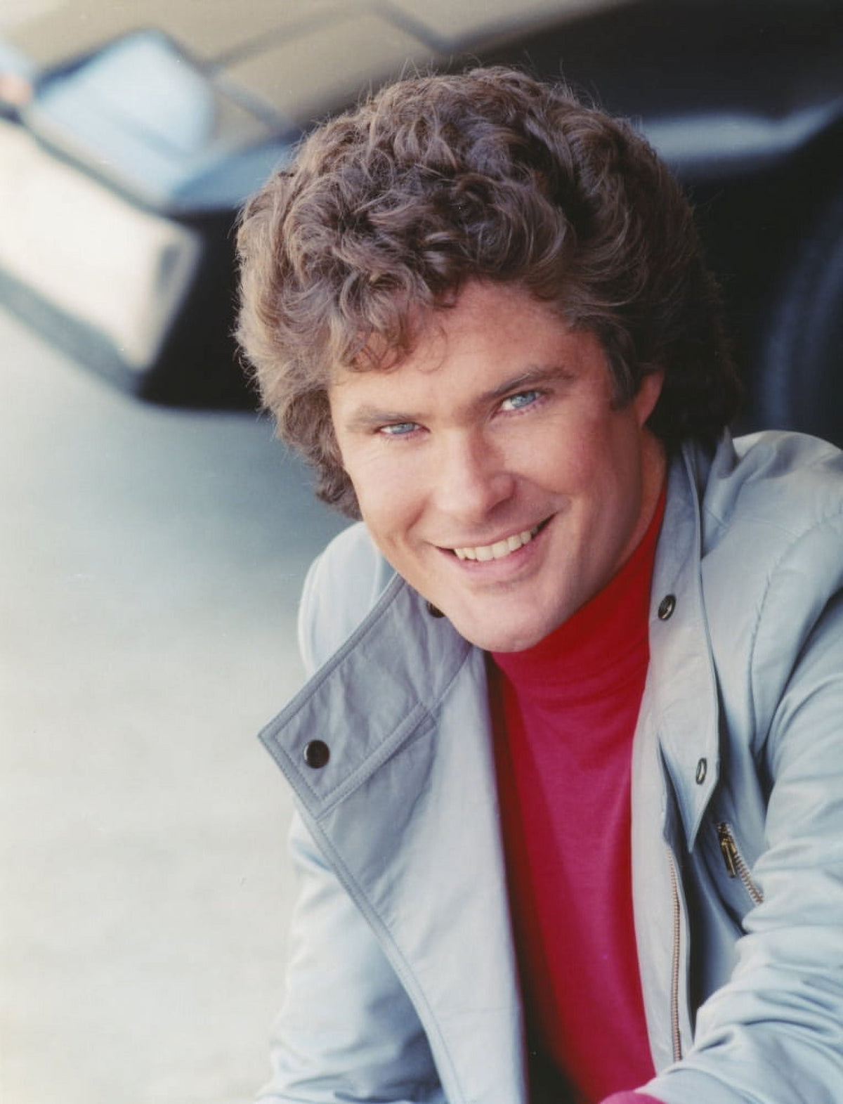 David Hasselhoff smiling in grey coat photo print.