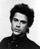 Rob Lowe iconic photo print showcasing the actor's charm.