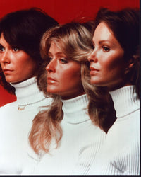Charlie’s Angels photo print featuring Kate Jackson, Farrah Fawcett, and Jaclyn Smith in white turtlenecks.