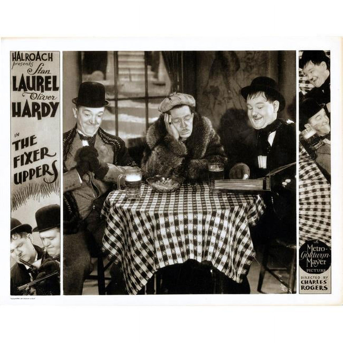 The Fixer Uppers lobby card print featuring Stan Laurel and Oliver Hardy from the 1935 film.