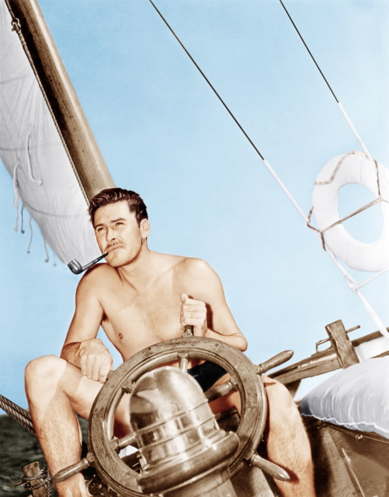 Errol Flynn relaxing on his yacht circa 1937 photo print
