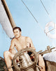 Errol Flynn relaxing on his yacht circa 1937 photo print