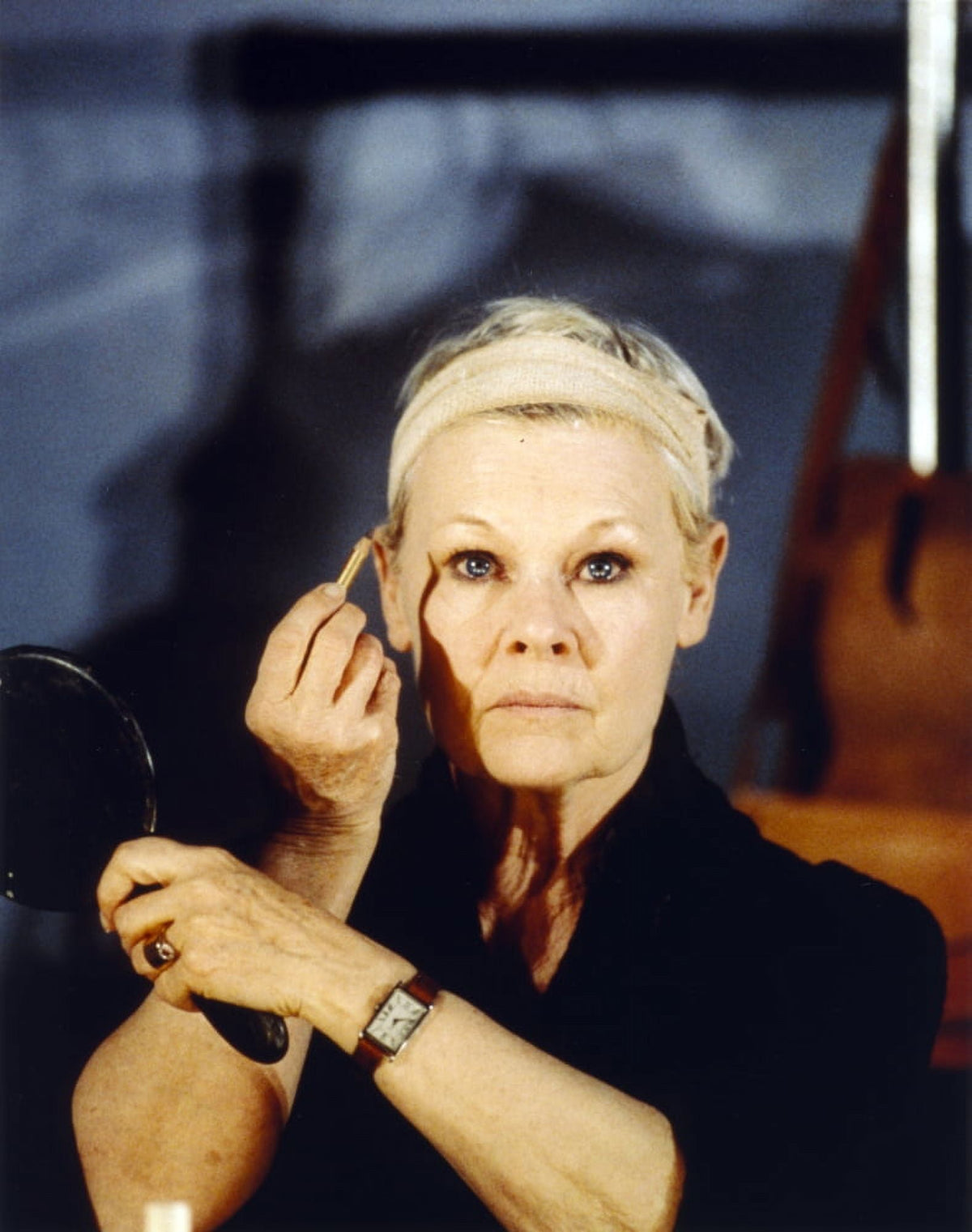 Close-up portrait photo print of Judi Dench, showcasing her captivating presence.